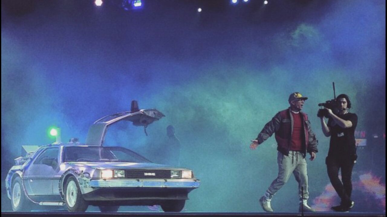 DeLorean on stage with fog and lights