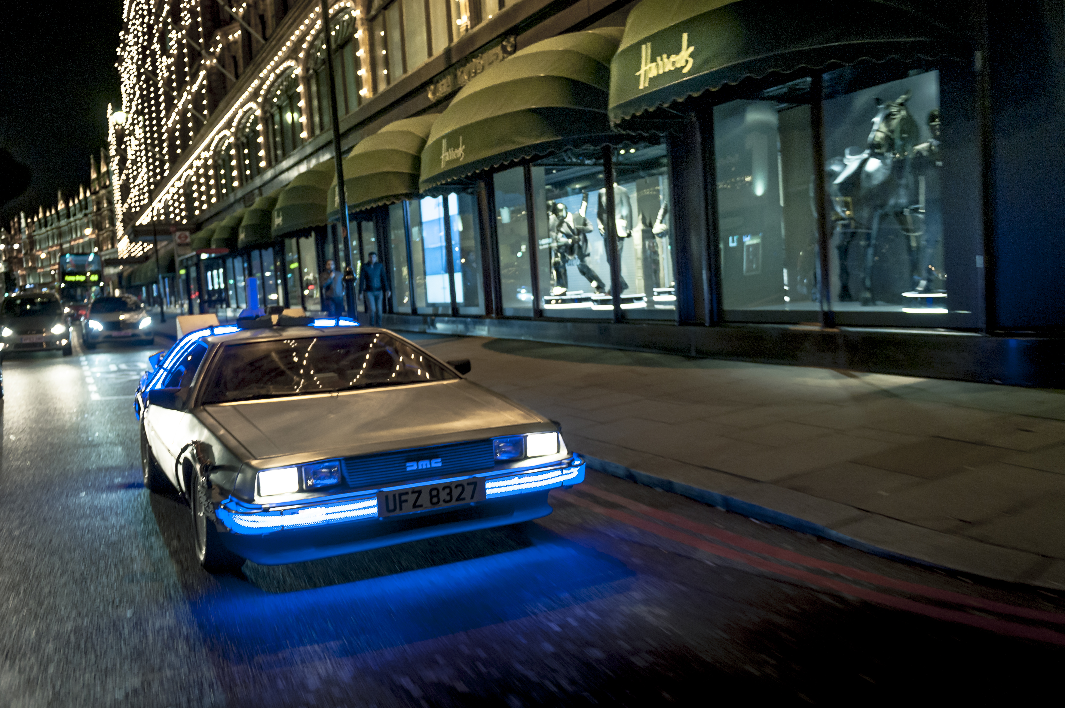 DeLorean outside Harrods London at night